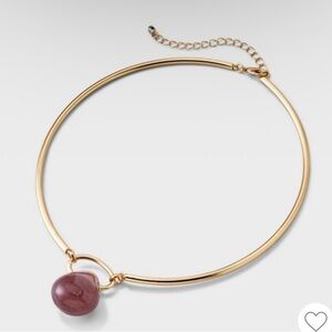 Collared Necklace with a hinged Pendant